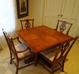 Mahogany Table with Parquet Top and 4 Chippendale Chairs w/ ulpolstery.  