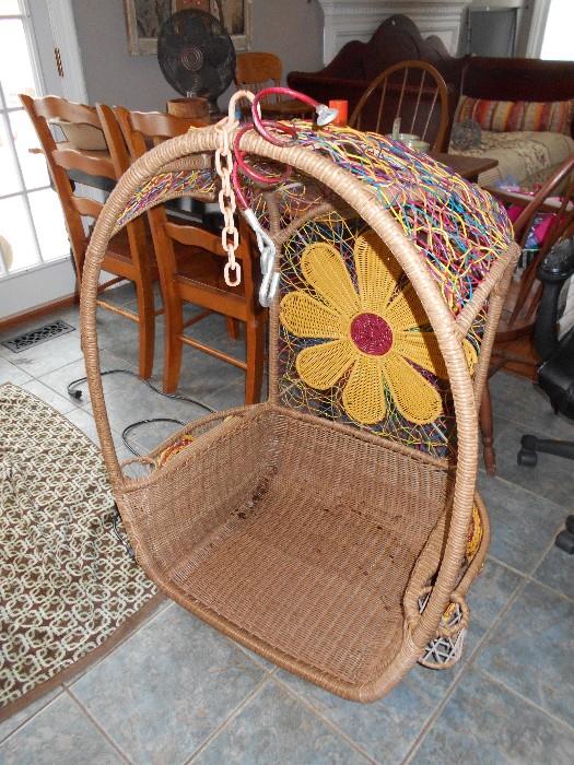 cool rattan hanging chair, colored wires on top