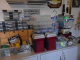 lots of containers of fishing lures