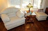 Italian leather chair and ottoman, glass-top end table (2), and Tiffany-style lamp