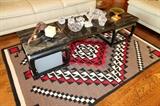 Native American rug and Asian coffee table
