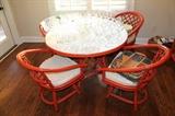 Painted rattan table with 4 swivel chairs