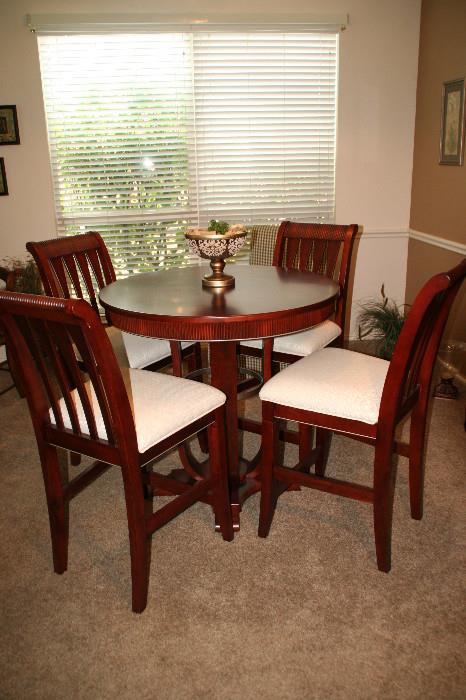 Mahogany Table and 4 Chairs from Rooms to Go furniture place