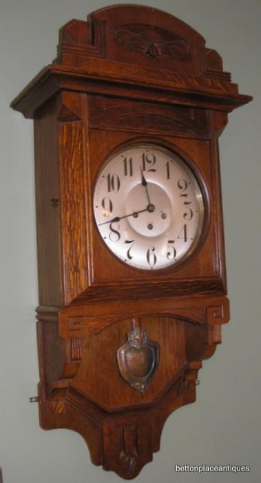 Gorgeous Art Nouveau English oak Wall Clock with copper pendulum made by John Chaplin