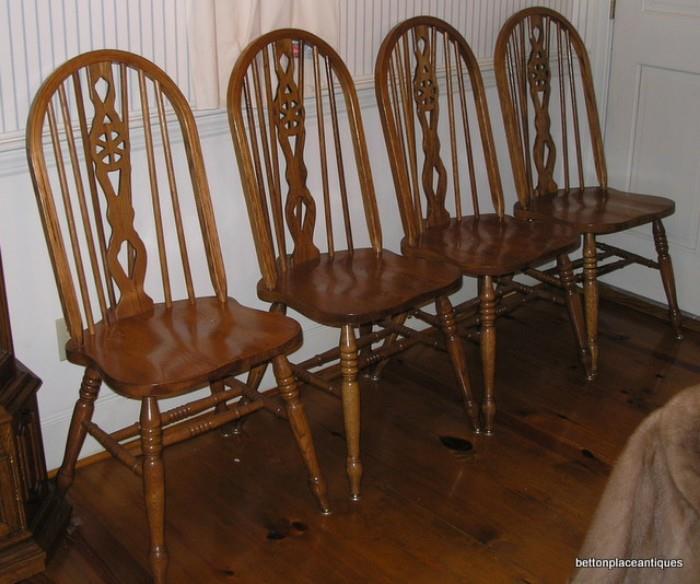 4 Matching larger seat Oak dining chairs