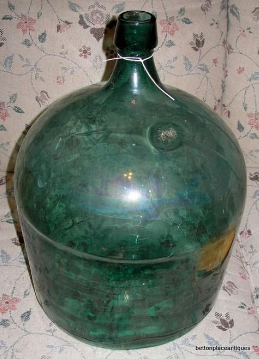 close up of large bottle 17 1/2 inches tall, 42 in circumference