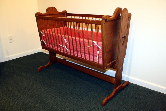 Hand crafted, full size rocking bassinet. Locking feature to stabilize rocking function.  Originally intended for infants up to 3months of age. However, great for dolls in a child's room.
