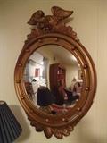 Federal Girandole Style Mirror.  This is a nice vintage reproduction of Federal period (1790 to 1815) mirrors that had concave glass surrounded with a gilded frame.  These were popular to the lady of the house because it allowed the hostess to see all at once glance when it was placed in the hall or dinning room. 
