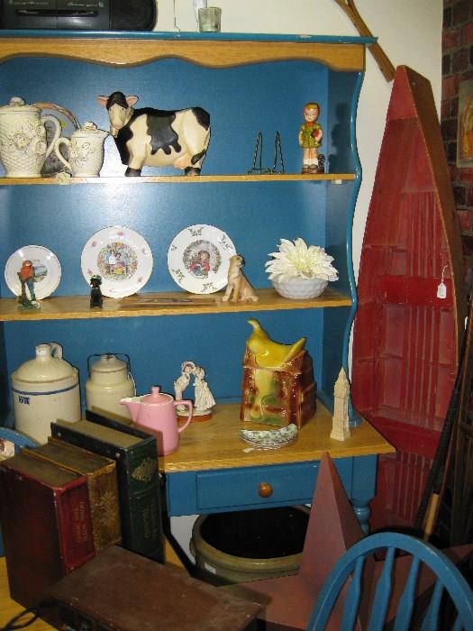 Nice china hutch,matches table and chairs.  Saddle cookie jar