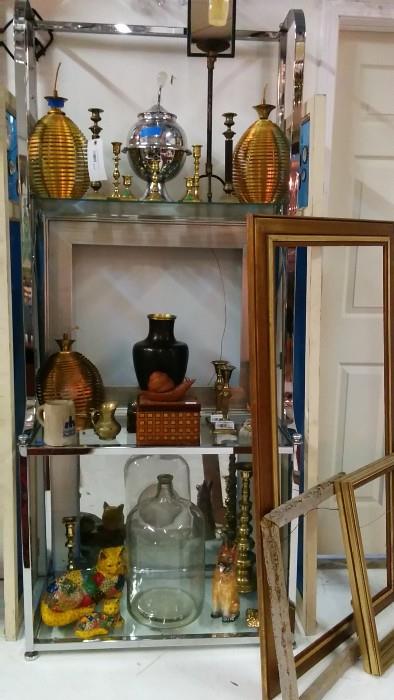 Nice chrome and glass etagere, filled with BS I found around the warehouse, after sweeping up one evening. A Contact Paper covered concrete cat - really?         Hey, it's period!