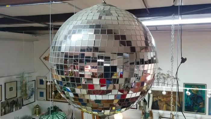 What warehouse sale is complete without a functioning disco ball? Guess the provenance and you get a free bottle of poppers!