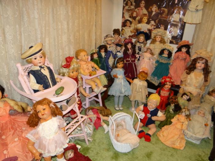 Just a few of the many dolls in her collection. There are lots more.