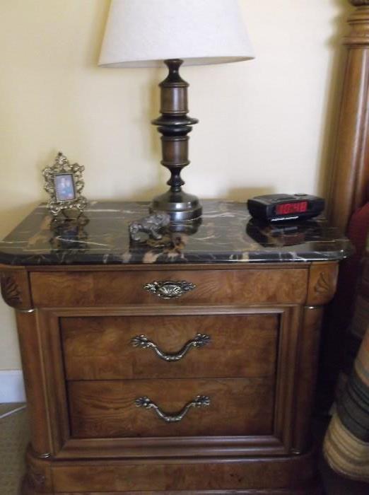 One of two marble top side tables 