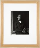 1007  Edward Weston (1886-1958 Carmel, CA)
''Mr. Brown-Jones of Georgia'', signed and dated with initials on the mount lower right: E.W. 1941, titled verso, gelatin silver print on paper under glass, paper size: 9.5'' H x 7.25'' W, est: $700/1000

Literature: E. Weston, ''50 Photographs'', New York, NY, 1947.  Note: Mr. Brown-Jones was a school teacher in Athens, Georgia. He was photographed in at least two poses: the present work where the sitter looks directly at the camera and another pose where Mr. Brown-Jones looks down at his clasped hands. Weston likely shot these images on December 15, 1941, a day when he photographed black models.  Provenance: Private Collection, Los Angeles, CA.  Condition: Visual: Generally good condition. A few small dents in the paper scattered throughout. Mounted to the back mat with glue. The recto and back mat are hinged together with linen hinge tape along the upper edge.    Your bid indicates acceptance of our Conditions of Sale.  AS-IS.  ALL SALES FI