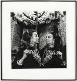 1021  Helmut Newton (1920-2004 German)
''Maria Felix at home in Cuernavaca'', signed, titled, inscribed and dated verso: Helmut Newton 1990, gelatin silver print on paper under glass, image size: 19'' H x 18.5'' W, est: $800/1200

Literature: Helmut Newton: Naked and Dressed in Hollywood'', Pascal de Sarthe Gallery, Los Angeles, CA, 1992, p. 20.  Provenance: Private Collection, Los Angeles, CA.  Condition: Visual: Generally good condition. A small tear in the margin upper left. Hinged to the recto mat with paper tape along the upper edge.    Your bid indicates acceptance of our Conditions of Sale.  AS-IS.  ALL SALES FINAL