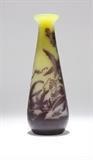 1027  A Galle cameo cut-back art glass vase
Circa turn of the 20th century, cameo signed ''Galle'', the flared rim above a tapering elongated body wheel-cut overall with vines issuing leaves, flowers and berries, 13.5'' H x 4.75'' Dia., est: $1000/2000

Provenance: Private Collection, Tujunga, CA.  Condition: Overall good condition. General light marks and scratches commensurate with age and handling. Localized areas of adhesive residue to body.  Your bid indicates acceptance of our Conditions of Sale.  AS-IS.  ALL SALES FINAL