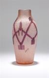 1030  A Legras Art Deco acid-etched art glass vase
Circa 1925, cameo signed ''Legras'', the baluster-form body acid-etched in relief and painted in magenta enamel with abstract linear decoration over a frosted pink and white-speckled ground, 12.25'' H x 5.5'' Dia., est: $500/700

Provenance: Private Collection, Tujunga, CA.  Condition: Overall good condition. General light marks and scratches commensurate with age and handling.  Your bid indicates acceptance of our Conditions of Sale.  AS-IS.  ALL SALES FINAL