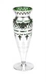 1077  A sterling silver overlay emerald glass vase, likely Alvin
Early 20th century, likely Alvin-Biederhase Co. / Alvin Silver Co., Providence, RI, marked ''999 / 1000 Fine LL 23'', the circular flaring rim over a baluster-form body supported on a circular foot, the pierced silver overlay engraved with acanthus to the shoulders and bellflowers on elongated stems to the body, monogrammed ''FLW'' in script to the foot, 12'' H x 4.125'' Dia., est: $500/700

Condition: Overall good condition. General rubbing, marks, scratches, and tarnishing commensurate with age. Heavier rubbing to marks and engraved decoration due to polishing. Scattered minor chips and fleabites to glass, primarily localized to underside of foot, the largest .375''-long. Monogrammed, as stated.  Your bid indicates acceptance of our Conditions of Sale.  AS-IS.  ALL SALES FINAL