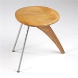 1116  An Isamu Noguchi ''Rudder'' stool, model IN-22
Designed 1944, unsigned, Isamu Noguchi (1904 - 1988 American), the circular birch wooden seat over a parabolic beech leg and two straight zinc-plated steel legs mounted with steel brackets to a plywood block mounted to underside of seat, 17.5'' H x 13.875'' W x 19.5'' D, est: $8000/12,000

Literature: Alexander von Vegesack et al, eds., Isamu Noguchi: Sculptural Design, exh. Cat., Vitra Design Museum, Weil am Rhein, 2002, pp. 120 - 124, models in different finishes illustrated p. 121.  Provenance: This lot, as well as the other Noguchi pieces on offer, was purchased by the Consignor circa 1949 directly from the Herman Miller Showroom at Chicago's Merchandise Mart in order to suit the decor of the Consignor's newly acquired modern apartment in Chicago's iconic Brockton building. The set has remained in the same Private Collection, Chicago, Illinois, ever since.  Condition: Structurally sound. General marks, scratches, nicks, and rubbe