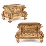 1162  A pair of Italian Rococo carved and gilt wood jardinieres
Late 19th century, each with a beveled rectangular edge supported by C-scroll corners centering a rocaille-edged reserves inset with a diaper-patterned ground to three faces, over a bombe rocaille base with foliate C-scroll knees, raised on scroll feet, 2 pieces, each: 16'' H x 23.75'' W x 14.75'' D, est: $3000/4000

Provenance: Private Collection, La Jolla, CA.  Condition: Overall good condition. Each with general marks, scratches, rubbed wear and scattered minor chips to giltwood commensurate with age. Shrinkage cracks at joints.  Your bid indicates acceptance of our Conditions of Sale.  AS-IS.  ALL SALES FINAL