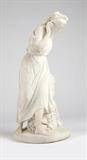 1194  An Italian carved marble figure 
Late 19th / early 20th century, unsigned, depicting a standing maiden, one hand tucking a flower behind her ear, the other hand resting on an ivy-entwined stump, on a circular base, 31'' H x 13.5'' W x 14'' D, est: $1500/2500

Provenance: Property of an Estate, Montecito, CA.  Condition: Overall good condition. Scattered minor marks and nicks. The figure lacking one finger.  Your bid indicates acceptance of our Conditions of Sale.  AS-IS.  ALL SALES FINAL