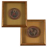 1205  Two Russian icons
18th century, The Woman at the Empty Tomb and Saint Tychon, each egg tempera on circular gesso wood panel mounted within a contemporary glazed shadow box, each icon: 4.5'' Dia., est: $800/1200

Provenance: Benedicte Oehry, Arlington Gallery, Santa Barbara, CA, Estate Palos Verdes Estates, CA.  Condition: Overall: 9.825'' H x 9.5'' W x 2'' D; 10.625'' H x 10.125'' W x 2'' D. Each with craquelure throughout and scattered touch-ups.    Your bid indicates acceptance of our Conditions of Sale.  AS-IS.  ALL SALES FINAL