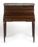 1246  A Louis Philippe bureau a cylindre
Second quarter 19th century, of mahogany with gilt brass mounts and line inlay, the rectangular top of variegated red marble within a pierced three-quarter gallery over three frieze drawers above a cylinder with a retracting lid enclosing a fitted interior and a hinged slant front reversing to a gilt-tooled red leather writing surface, over a long drawer with false drawer fronts, on fluted circular tapering legs with capped toupie feet, 42.5'' H x 35.5'' W x 19.5'' D, est: $1000/2000

Provenance: Estate, San Marino, CA.  Condition: Overall good condition. General marks, scratches, nicks and wear commensurate with age and use. Scattered white marks. Lifting to a section of metal line inlay on left-hand side panel. A crack across width of leather writing surface along the fold. No key.  Your bid indicates acceptance of our Conditions of Sale.  AS-IS.  ALL SALES FINAL