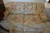 Floral loveseat.