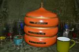 Unique orange stacking canister set.