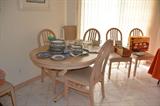 This white wash dining set has six chairs and is like new.