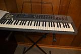 Casio keyboard with stand.