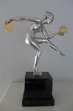 Art Deco metal sculpture depicting dancing female nude mounted on marble plinth
