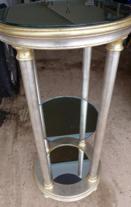 Silver and gold gilded Art Deco circular accent table with mirrored shelves. 38-1/2"H x 18"W
