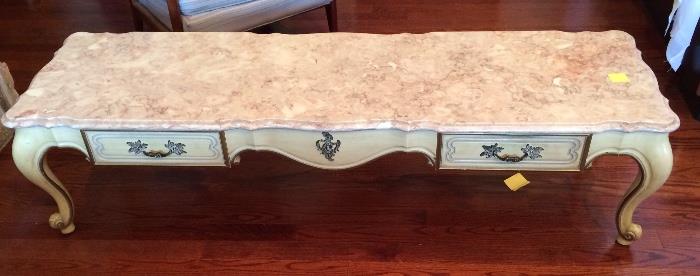 French Provincial coffee table with marble top.