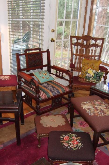 antique chairs and rockers and multiple needlpoint footstools