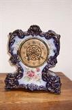 Waterbury clock in porcelain case