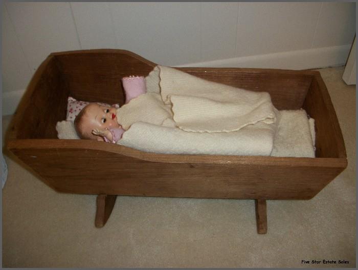 This reproduction cradle is over 60 yrs. old.
