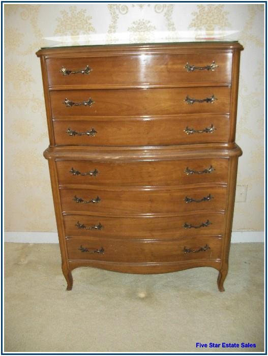 There are 2 of these really nice vintage dressers.