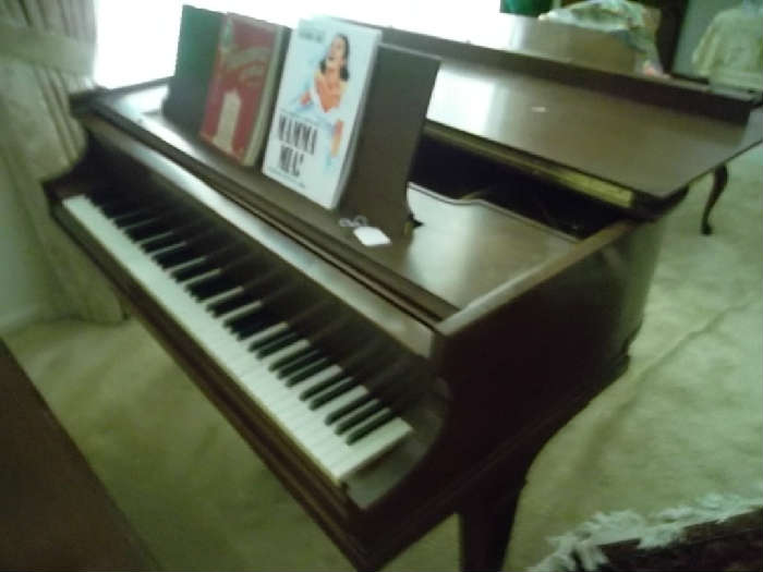 PIANO
Vintage Baldwin baby grand piano in walnut