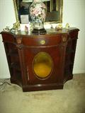 VINTAGE CONSOLE CABINET
Cabinet with side shelves and drawer and convex mirrored glass central panel