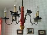 Charming folk art chandelier.