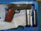 Model 1911 45 cal.  A1 w/ suppressor