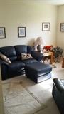 blue sofa with matching chair and ottoman