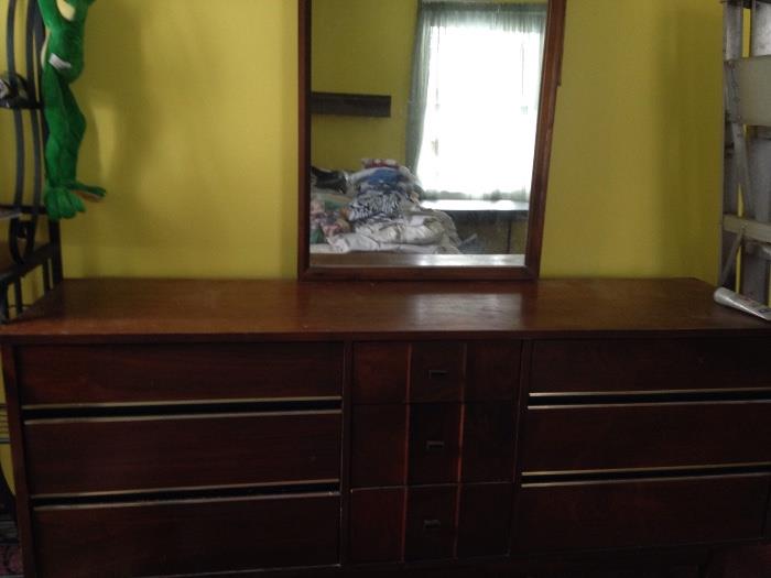 Bedroom set with triple dresser, upright dresser, and night stand