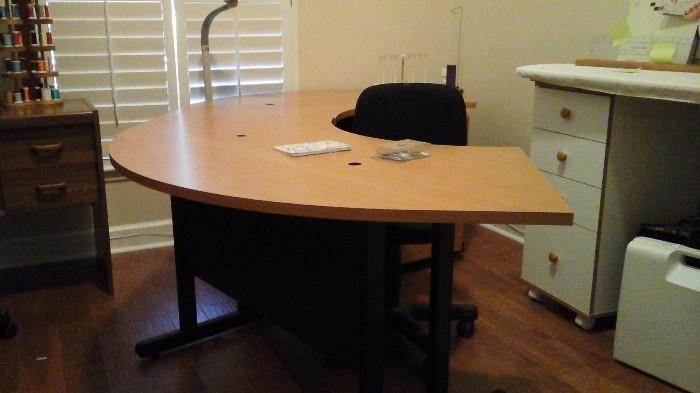 Semi-circle two piece sewing/crafting table also shown with one of two secretarial chairs