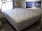 Queen size mattress and brass bed