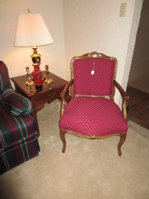 Pair of dark red upholstered arm chairs