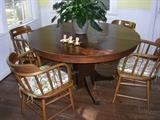 Table from Grace Hall. 6 Captains Chairs.