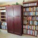 tons of dvd's and books wall unit, shelving