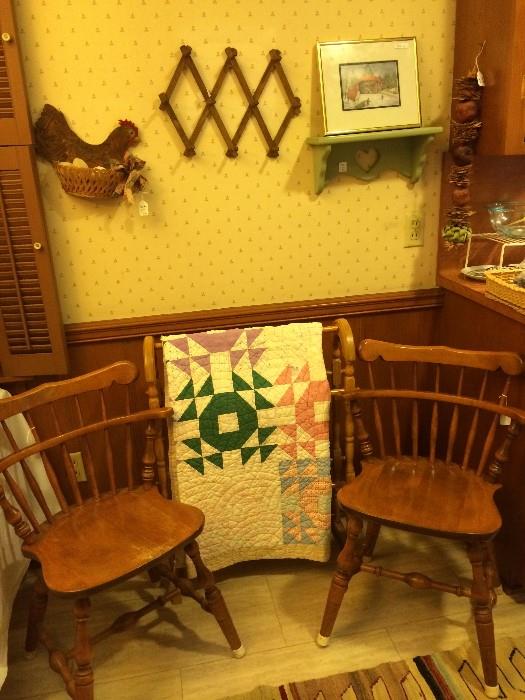      One of several quilts; matching maple chairs